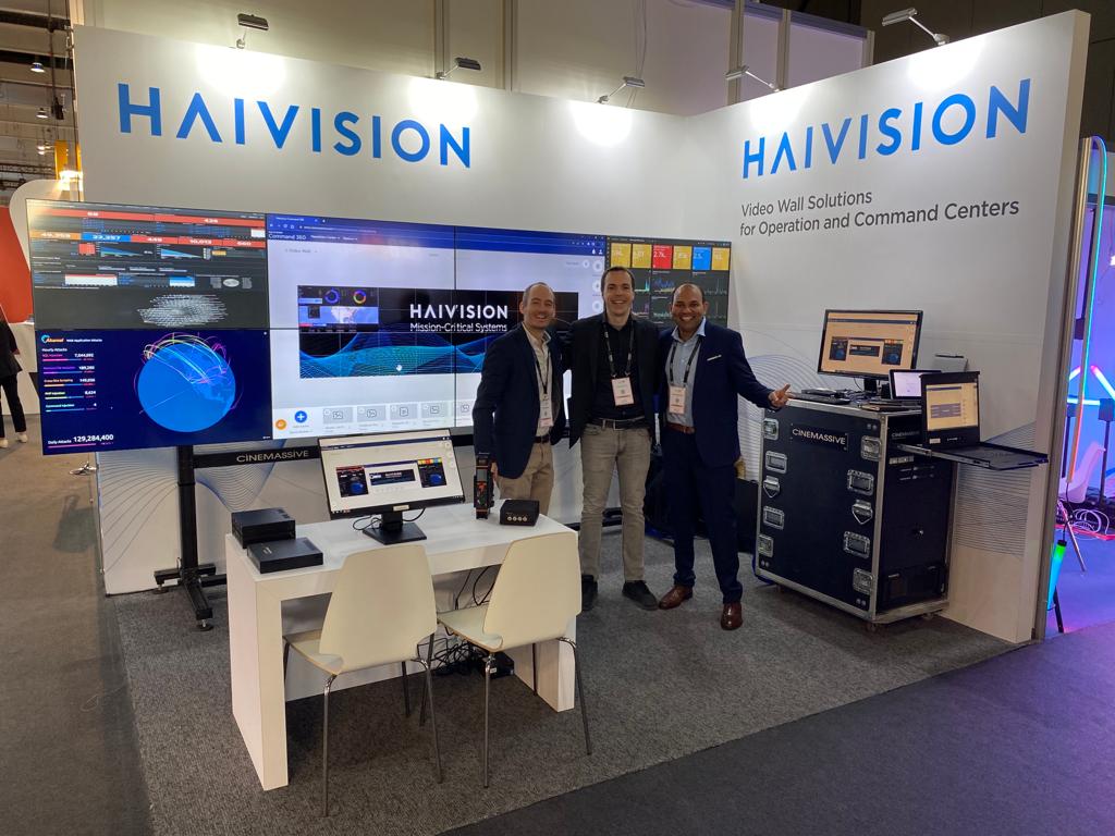 Image of Haivision team in front of Command 360 display at ISE 2023